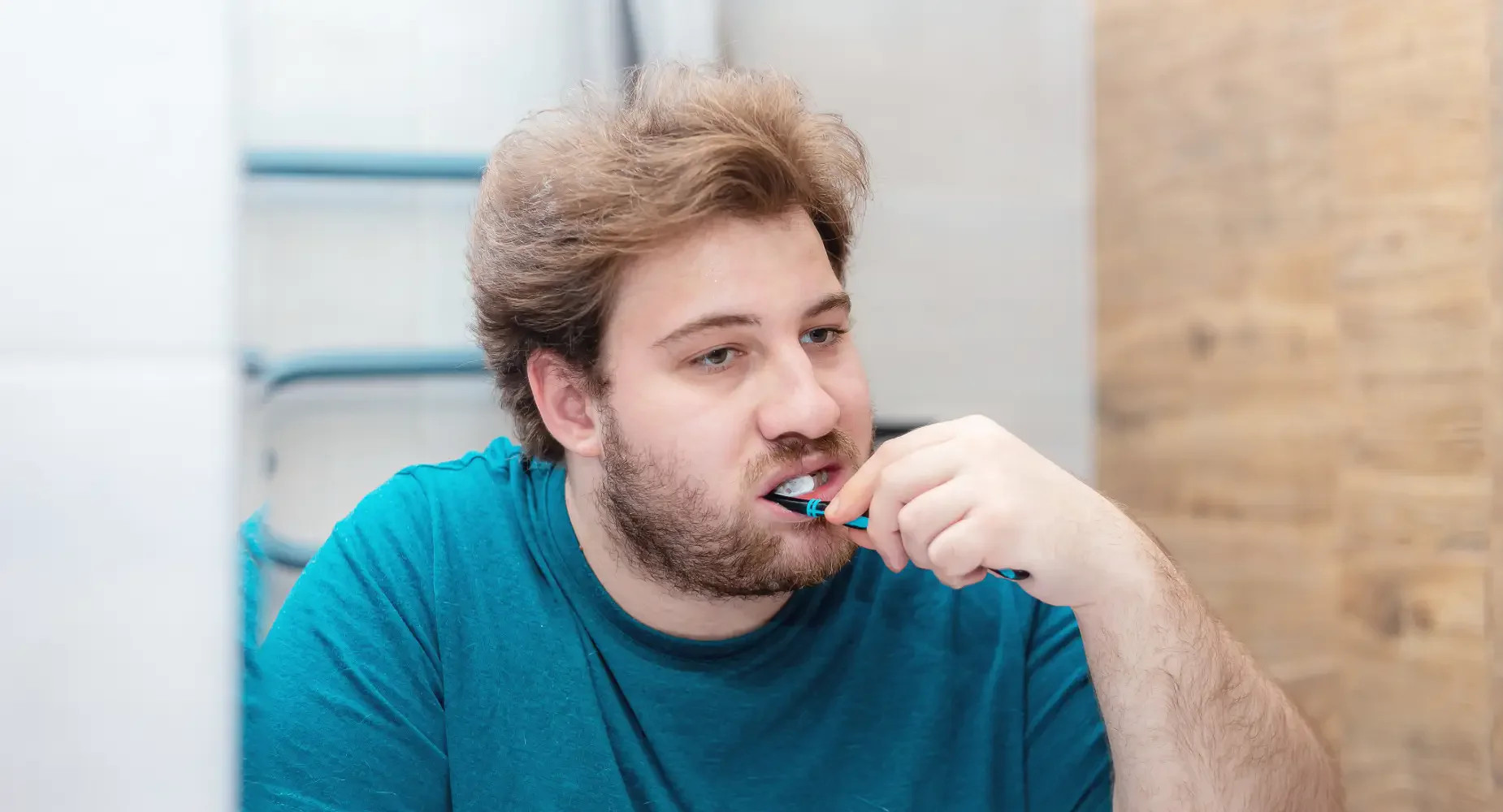 Person maintaining good oral health — daily routine