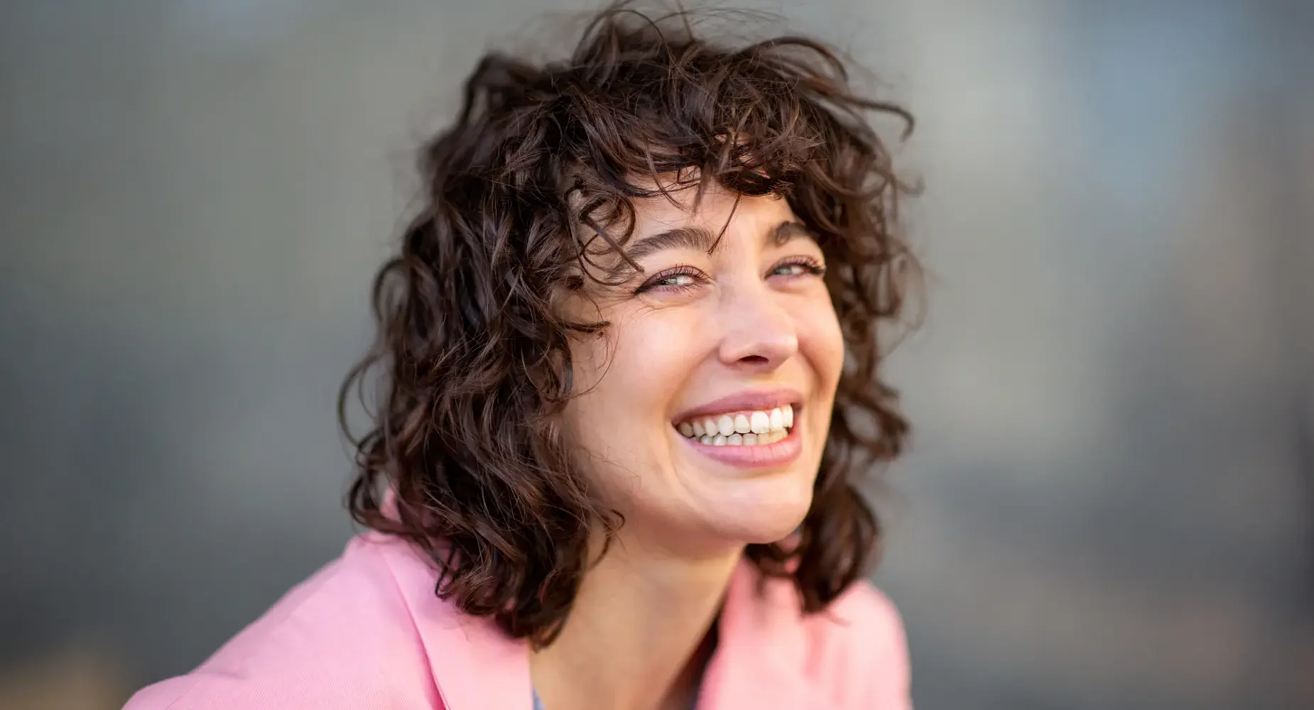 Person smiling with healthy teeth — oral health improvement